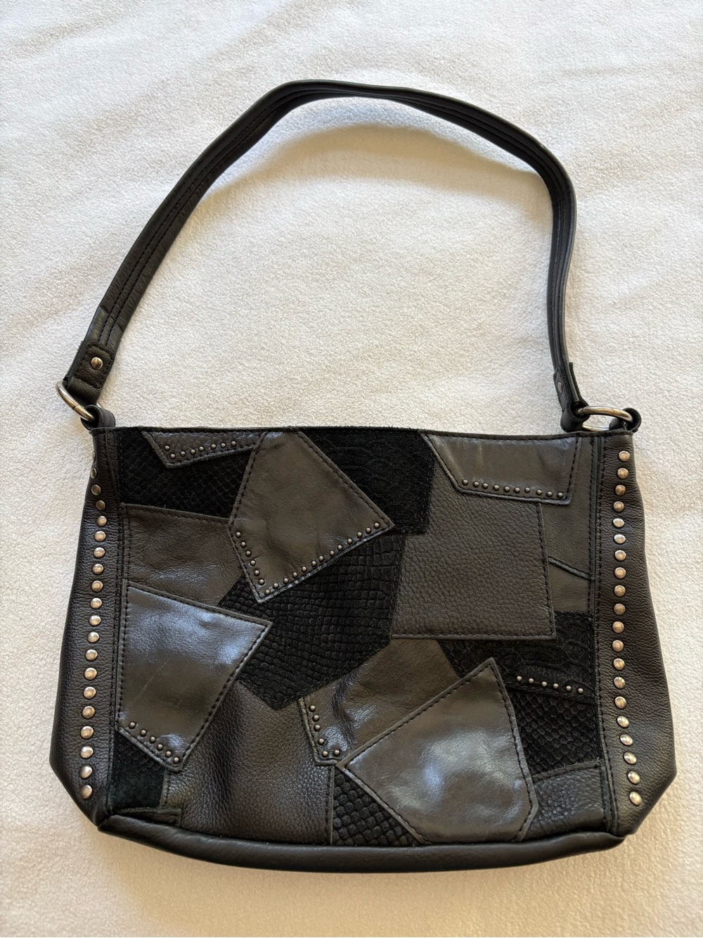 The Sak black patchwork leather purse